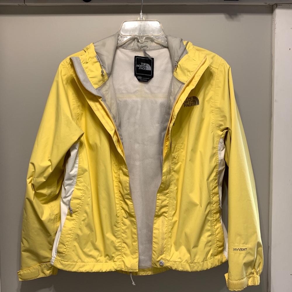 The North Face yellow rain jacket